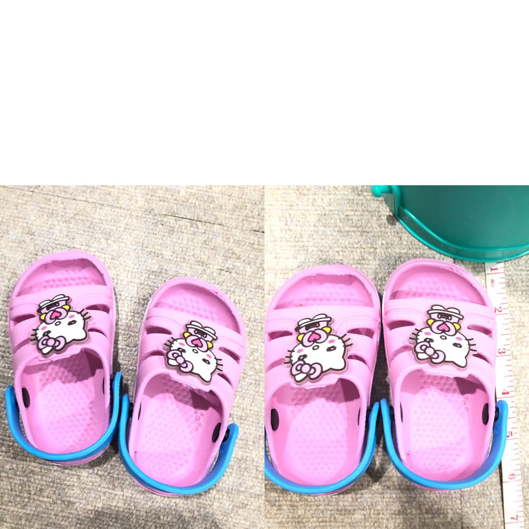 pink baby slippers