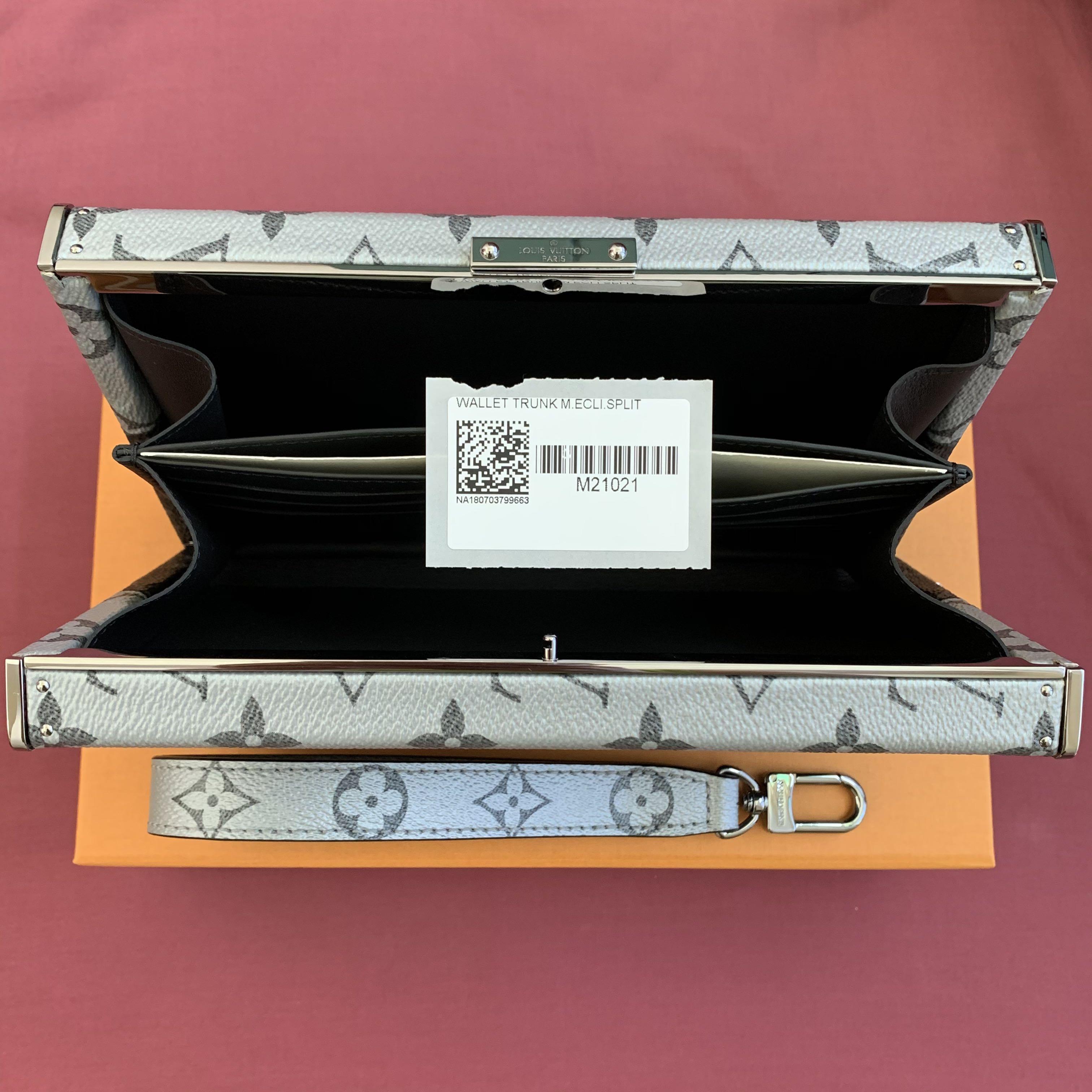 Louis Vuitton Monogram Eclipse Split Wallet Trunk (Category: Bags & Wallets) located in Singapore. Submitted by outofmyluxcloset (Listing ID 1040831720, Image 3). Description: The original wallet trunk from the maestro Kim Jones’ final collection at Louis Vuitton. Inner gusset with 12 card slots and slot for bank notes. Retail: S$8,400 Comes full set with original receipt, dust bags, box and paper bag. .