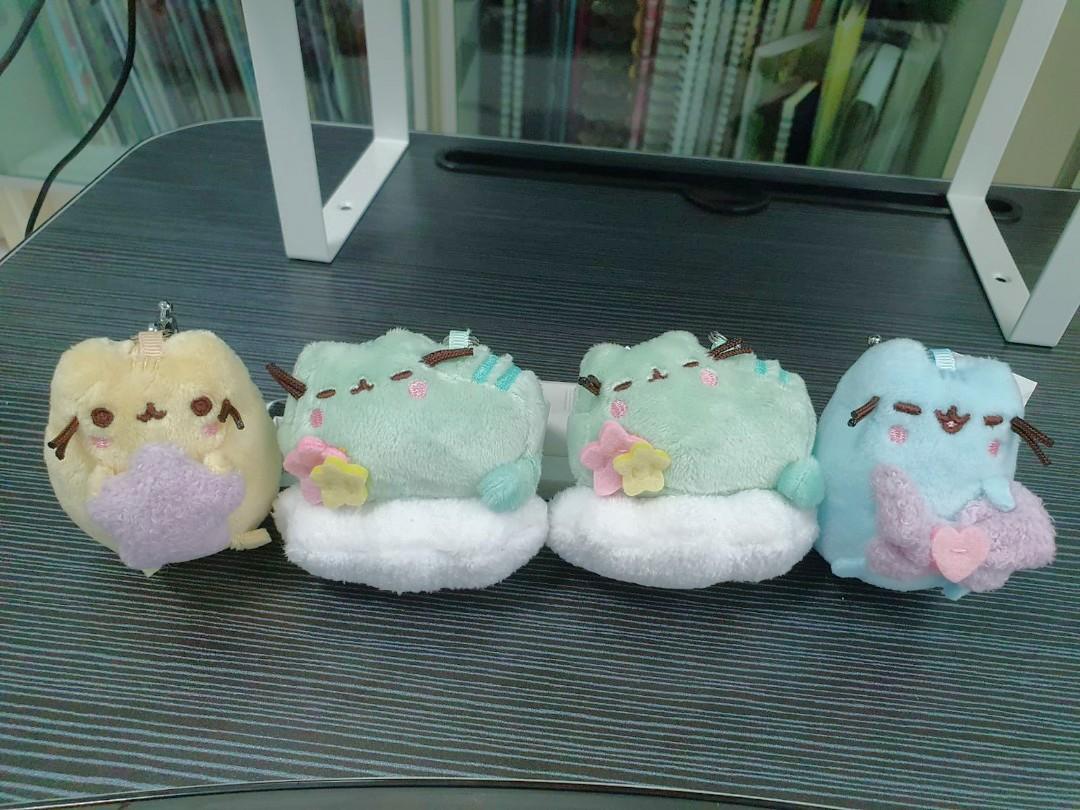 pusheen with rainbow plush