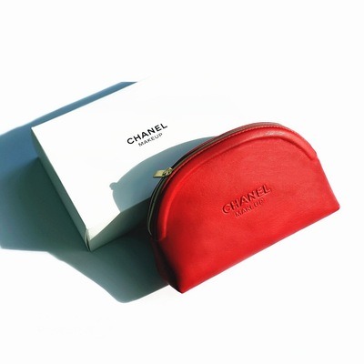 Chanel makeup bag red top