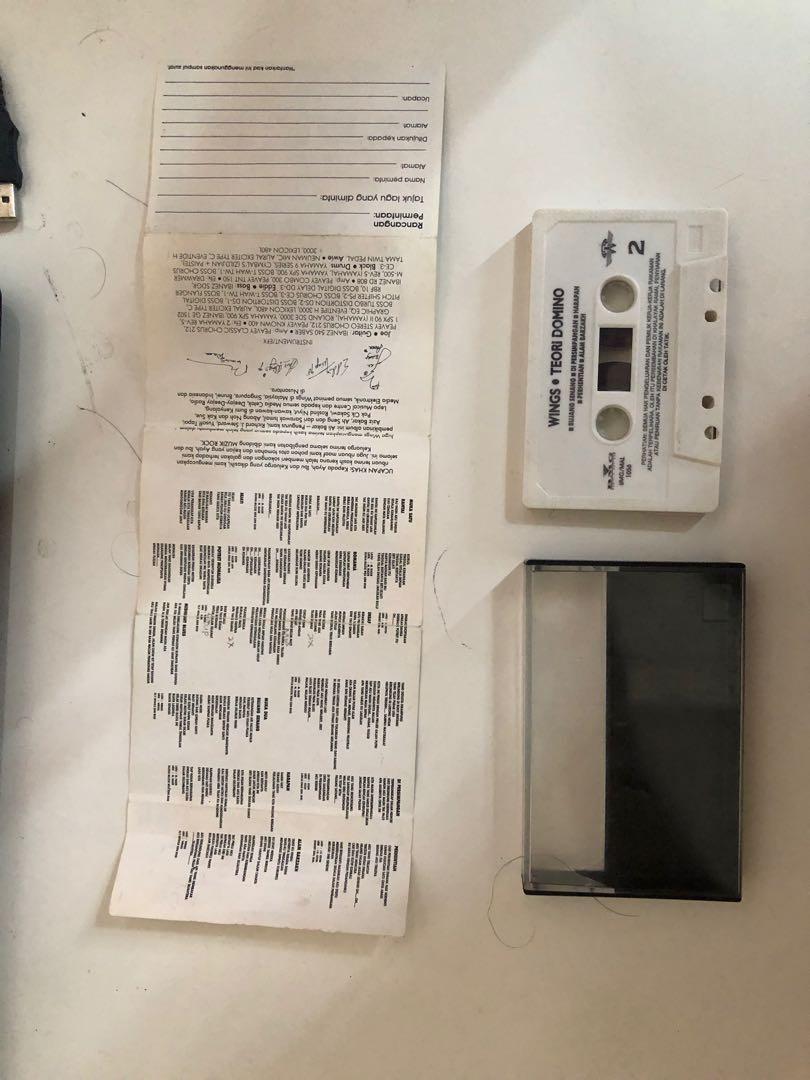 Kaset Ella USA & Kaset Wings Teori Domino, Hobbies & Toys, Music & Media, CDs & DVDs on Carousell