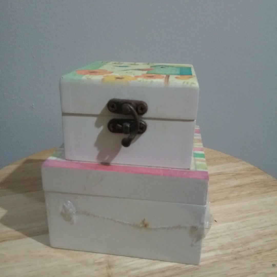 (Set) Small Wooden Boxes (Category: Storage Boxes & Baskets) located in Taguig. Submitted by garagesale_ph (Listing ID 1040910440, Image 2). Description: Take both for 150. Some yellowing on the white paint. These have been in storage for a while. Bigger box (Sealed) - Outer dimensions: 4x4x2.5 inches Smaller box - Outer dimensions: 3x3x2 inches bpi,bdo,gcash.