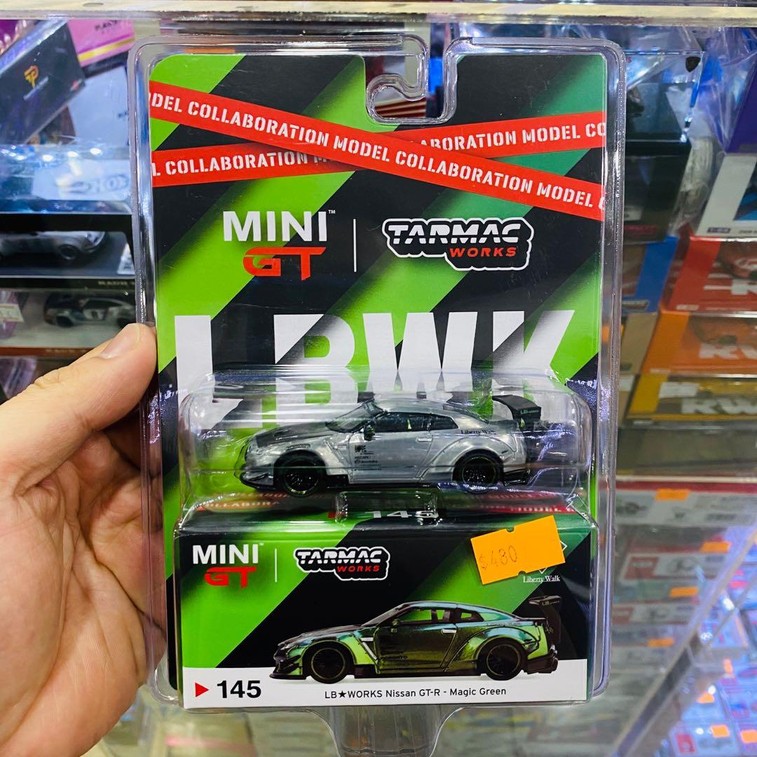Tarmac Works X Mini Gt 1 64 Lbwk Rhd Magic Green Lb Works Nissan Skyline Gt R R35 Chase Car Liberty Walk 日產戰神gtr 幻彩綠隱藏車 玩具 遊戲類 玩具 Carousell