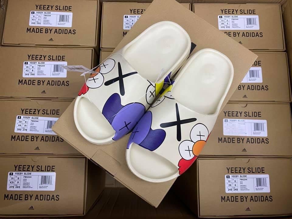 yeezy slides kaws