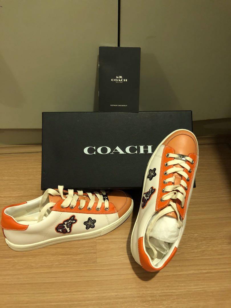 Orange coach shoes on sale