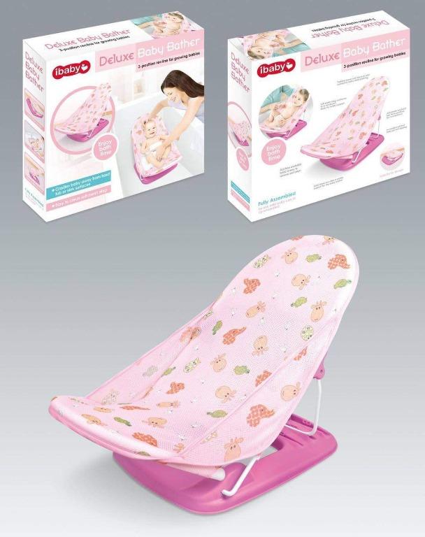 Deluxe Baby Bather (Category: Bathtub & Bath Accessories) located in Manila. Submitted by affordshopz (Listing ID 1041235633, Image 2). Description: BRAND NEW Safely and securely bathe your newborn in comfort with the Deluxe Baby Bather. A soft, mesh sling cradles your baby, while multiple recline positions provide the most comfortable positioning for your little one, making it the perfect choice from the very first sponge bath. • 3-position recl