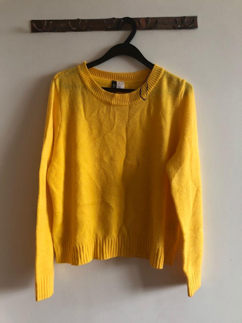 yellow sweater coat