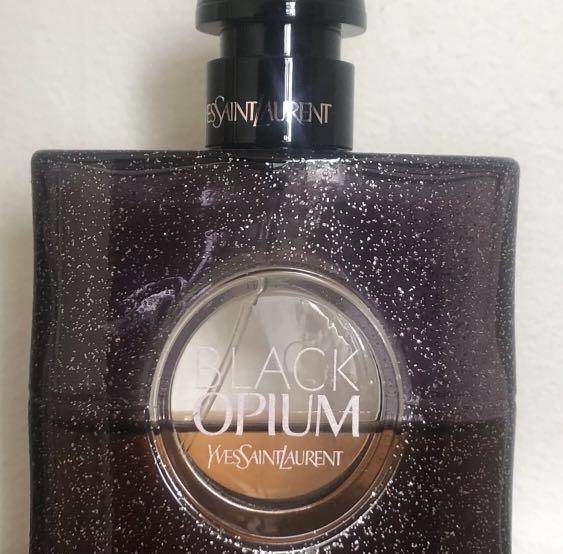 Black opium store glowing parfum