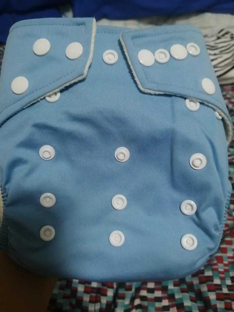 Next9 cloth diaper (set of 3) (Category: Babies & Kids Fashion) located in Quezon City. Submitted by markikay814 (Listing ID 1041488071, Image 2). Description: Next9 cloth diapers with microfiber inserts. 3pcs, colors: blue (2pcs) and white ( 1pc). Sold as set.