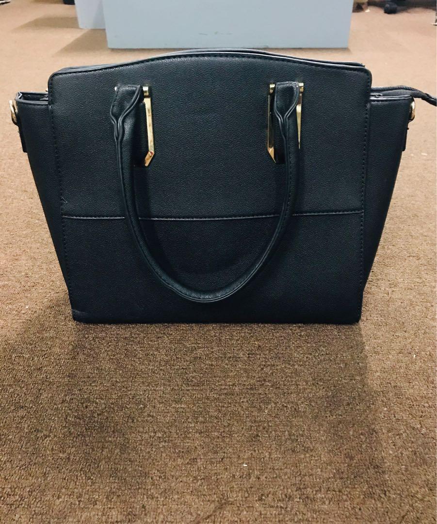 La terre fashion black purse sale