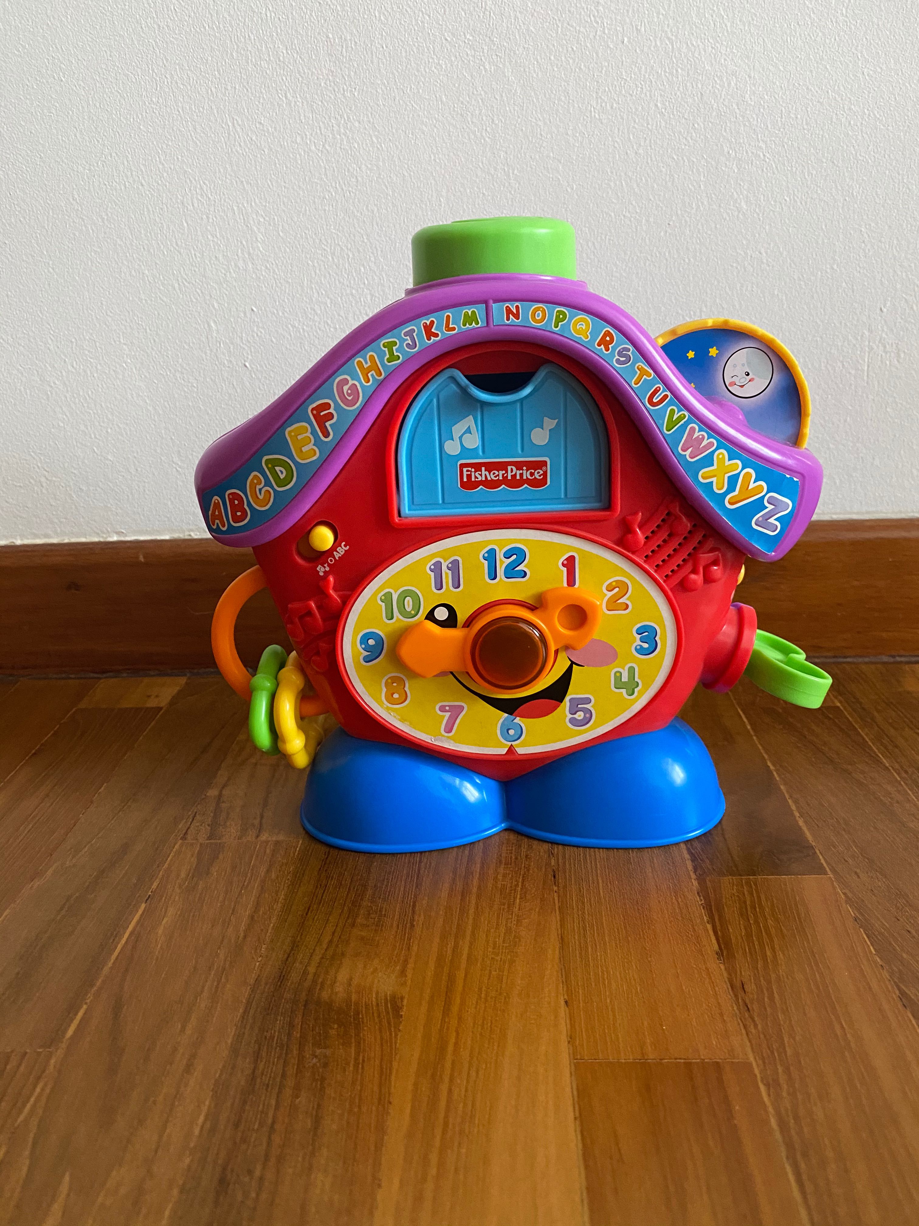 Fisher price peek best sale a boo clock