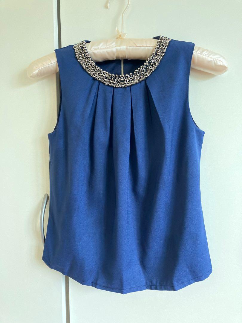 Elegant sleeveless tops discount