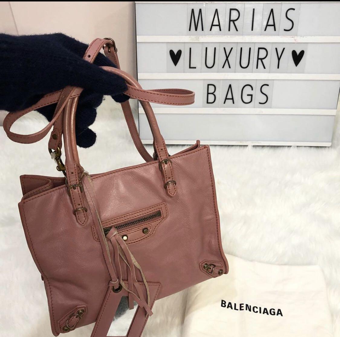 Authentic Papier Balenciaga (Category: Luxury Bags & Wallets) located in Pasay City. Submitted by marialuxurybags (Listing ID 1042212038, Image 1). Description: 💯original Money back guaranteed if proven fake In very good used condition (almost new) Inclusions: Dustbag, strap and authenticity cards.