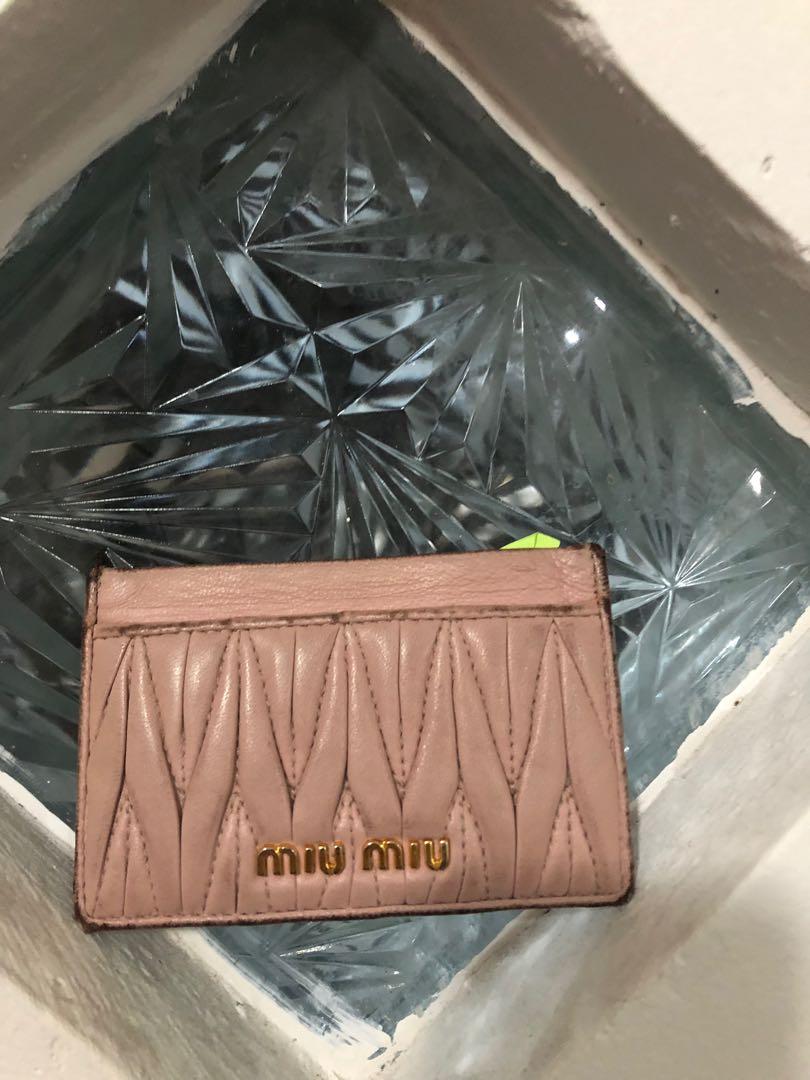 card case (Category: Luxury Bags & Wallets) located in Quezon City. Submitted by yumiizashop (Listing ID 1042129719, Image 1). Description: 100% original miumiu with color transfer and dirt.