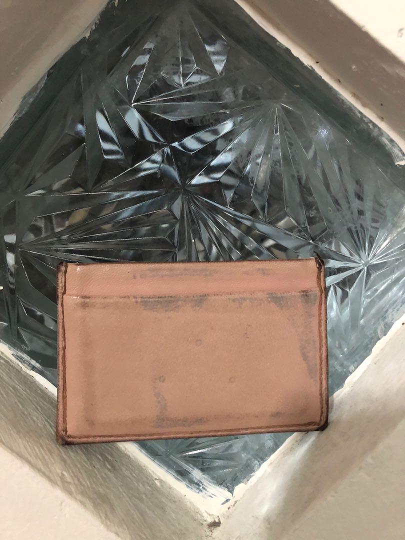 card case (Category: Luxury Bags & Wallets) located in Quezon City. Submitted by yumiizashop (Listing ID 1042129719, Image 2). Description: 100% original miumiu with color transfer and dirt.