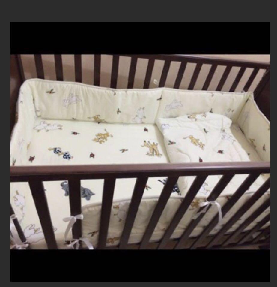 Dwelling Wooden Crib (Category: Cots & Cribs) located in Quezon City. Submitted by LoveDainty (Listing ID 1042147311, Image 2). Description: DWELLING ( Brand ) Wooden Crib. Can be use as bed side crib, can be a toddler bed, can be a playpen 1. With 4 inch URATEX Purifoam Foam ( w/ milk stain but still in excellent condition ) 2. With crib bumper guard ( excellent condition ) RFS ( out grown ).