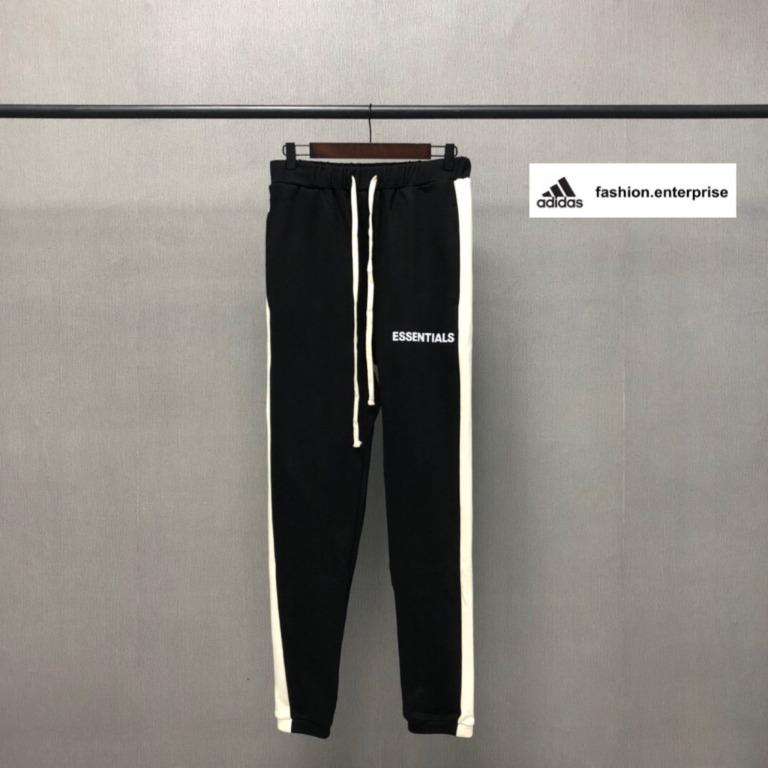 Fear of god essentials side stripe sweatpants black sale