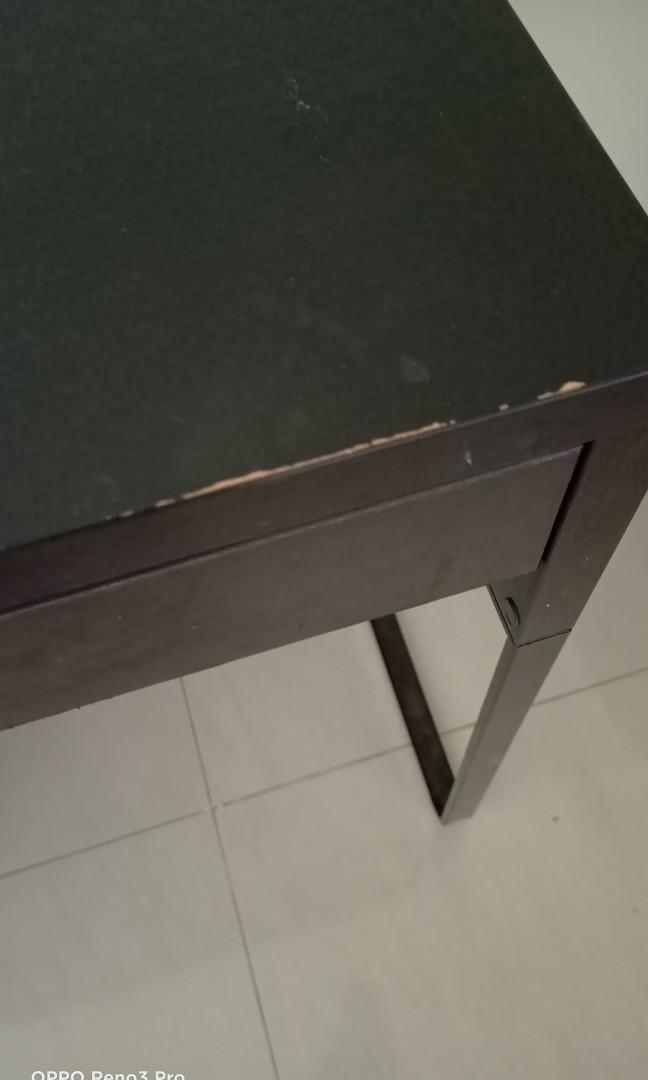 IKEA study table (Category: Tables & Sets) located in Singapore. Submitted by caring888 (Listing ID 1042059965, Image 3). Description: Selling a good condition IKEA desk with drawer. Black-brown, 73cm x 50cm. Please note: 1) One stretch of colour faded off (see 3rd pic). 2) One stationary holder at the side (see last pic) Self-collect at Bedok Reservoir Road (nearest mrt: Kaki Bukit) #ikea desk #ikea study table.