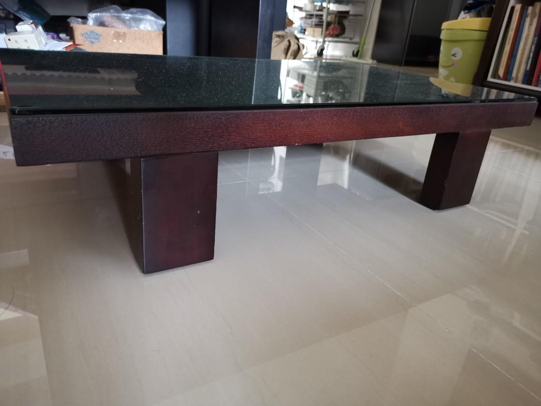 Low table (Category: Tables & Sets) located in Singapore. Submitted by reconnet (Listing ID 1042090246, Image 1). Description: This low table measuring 75cm x 45cm x 18cm was serving me well when I recently changed from tatami to a sofa set. Comes with a customised cut glass top. Self collect..