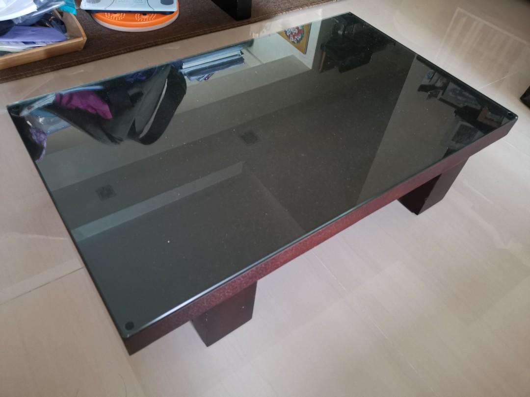 Low table (Category: Tables & Sets) located in Singapore. Submitted by reconnet (Listing ID 1042090246, Image 2). Description: This low table measuring 75cm x 45cm x 18cm was serving me well when I recently changed from tatami to a sofa set. Comes with a customised cut glass top. Self collect..