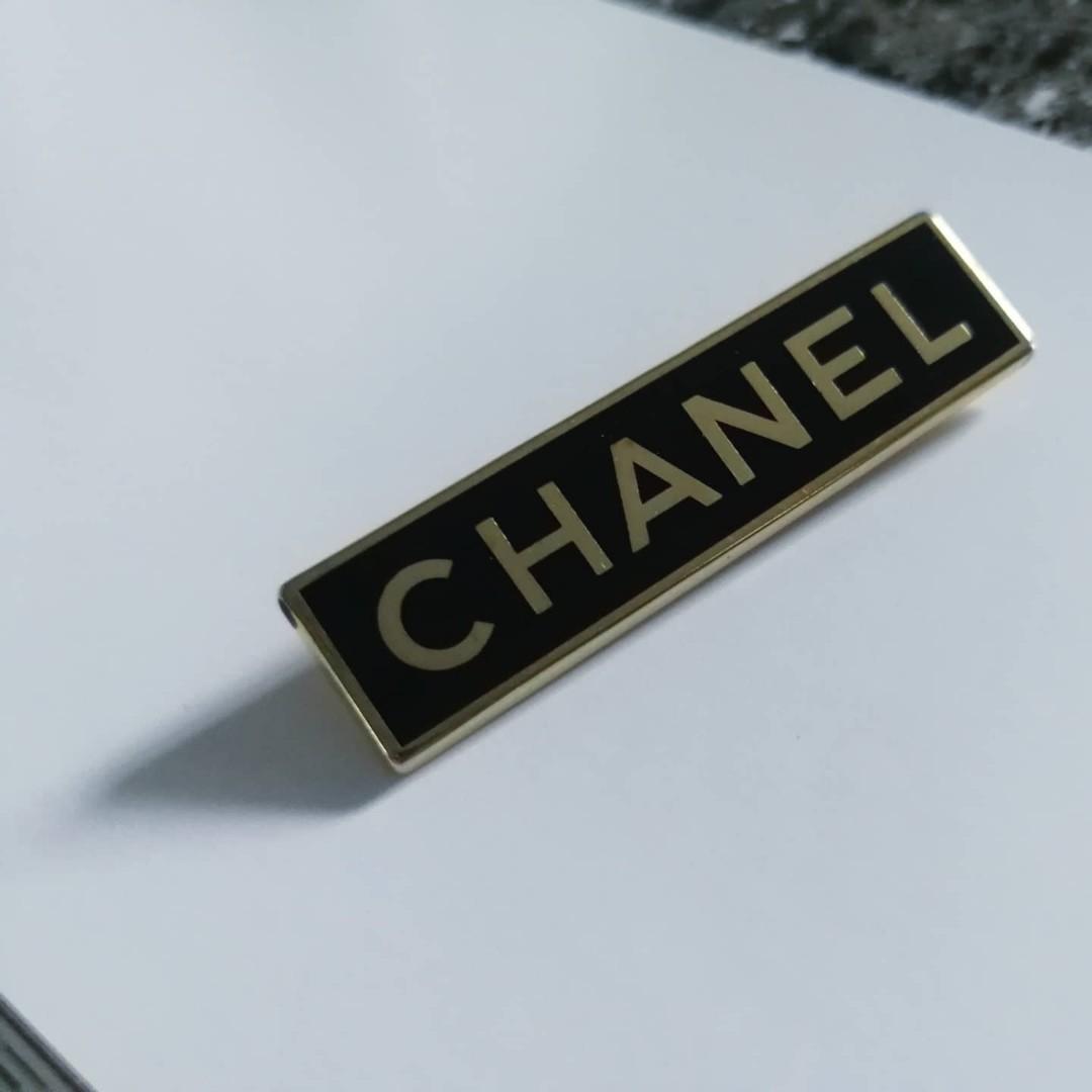 Chanel gold and black colour enamel and metal vintage Employee brooch pin  badge