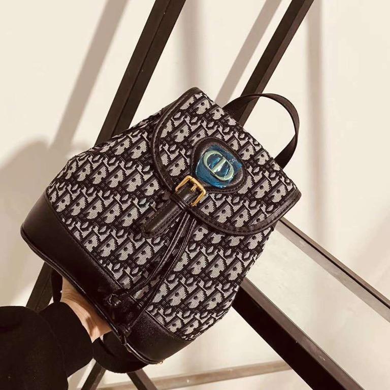 Dior hotsell canvas backpack