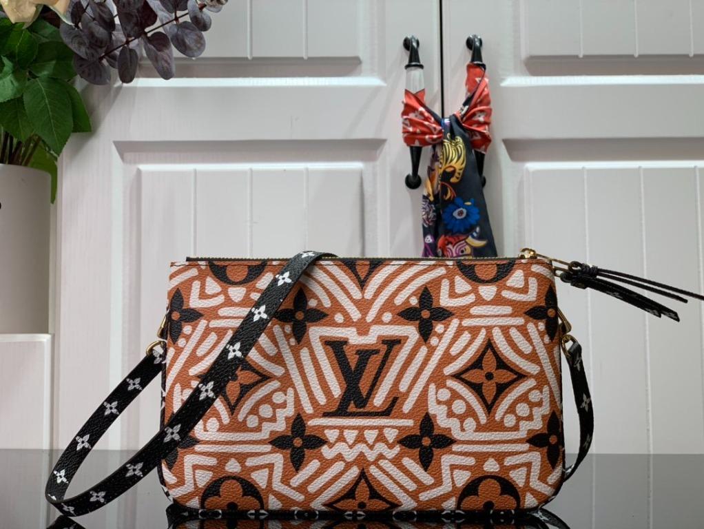 LV CRAFTY DOUBLE ZIP POCHETTE, Women's Fashion, Bags & Wallets, Purses &  Pouches on Carousell