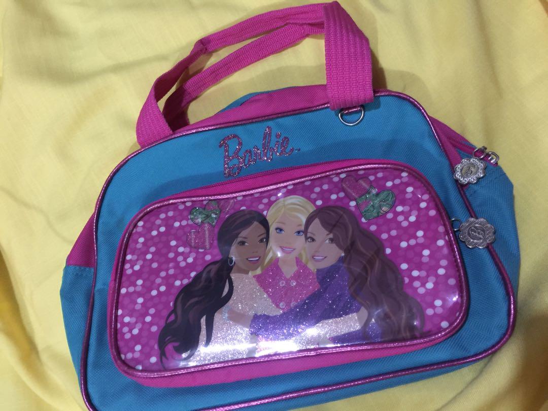 👜 Barbie Bag (550 from 650) (Category: Other Babies Going Out Needs) located in Makati City. Submitted by jennyitems (Listing ID 1042662224, Image 2). Description: 👛 Barbie Bag for Kids 👜 👜 Brand: Barbie Color: Pink & Blue 👜 Original Barbie 👜 High Quality Bag! 👜 Very Nice! Barbie Signature can be seen on the Inner & Outer Part of the Bag, even in Zipper & Key Chain. 👜 Can be given as a Gift 🎁 to your Child, Nieces or Inaanak 👧🏻👭.