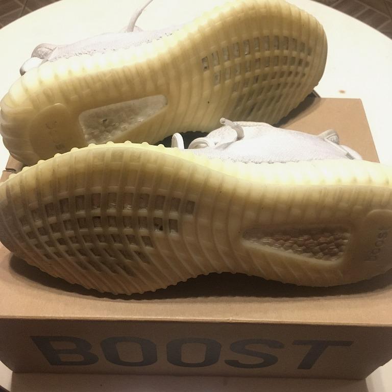 Adidas YEEZY 350 Boost V2 "Cream White" (Category: Sneakers) located in Malabon City. Submitted by lowretss (Listing ID 1042702944, Image 3). Description: Condition (8/10), issue shows dirt and slight yellowing as a sign of use, but definitely is still definitely durable and intact. It comes with its original box. The fitting of the 350 V2's are true-to-size, so it perfectly fits a US9.5 and a US10. The luminous colored Yeezy Boost 350 has a crea