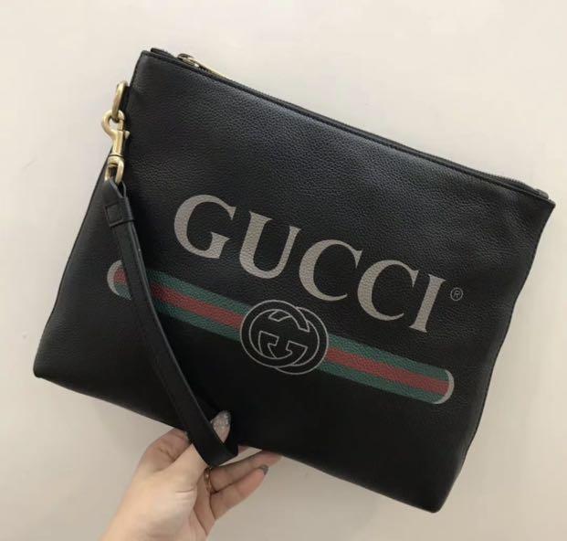 gucci logo clutch
