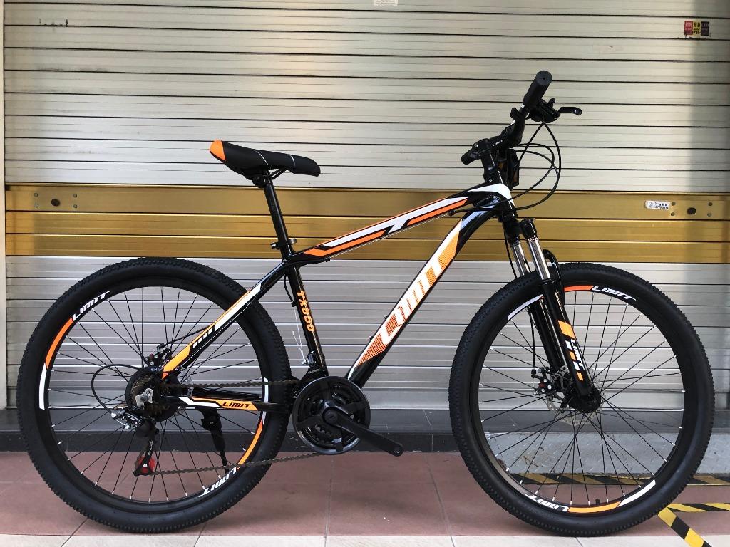 orange 26 inch bike