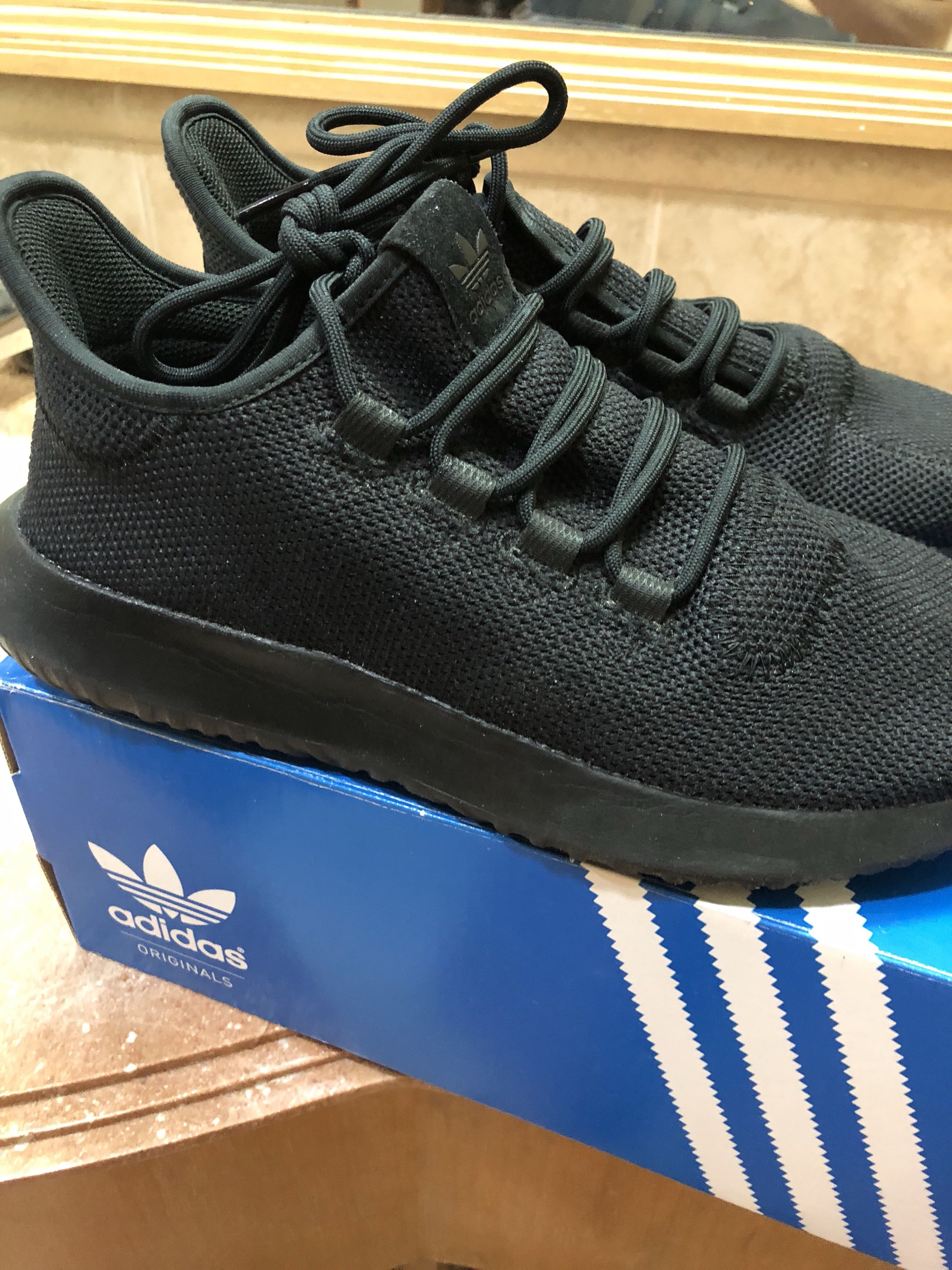 All black outlet tubular shadow