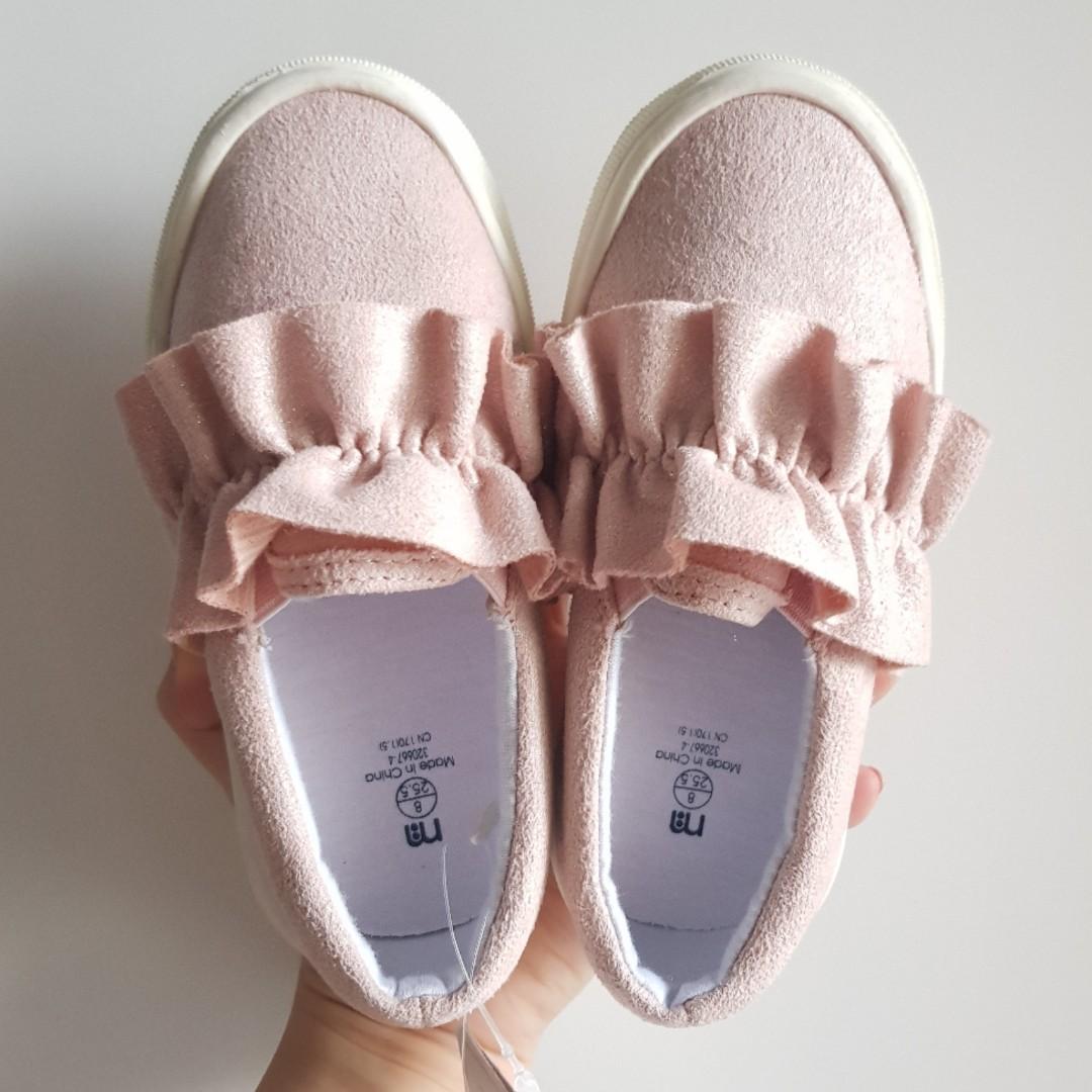 pink slip on sneakers