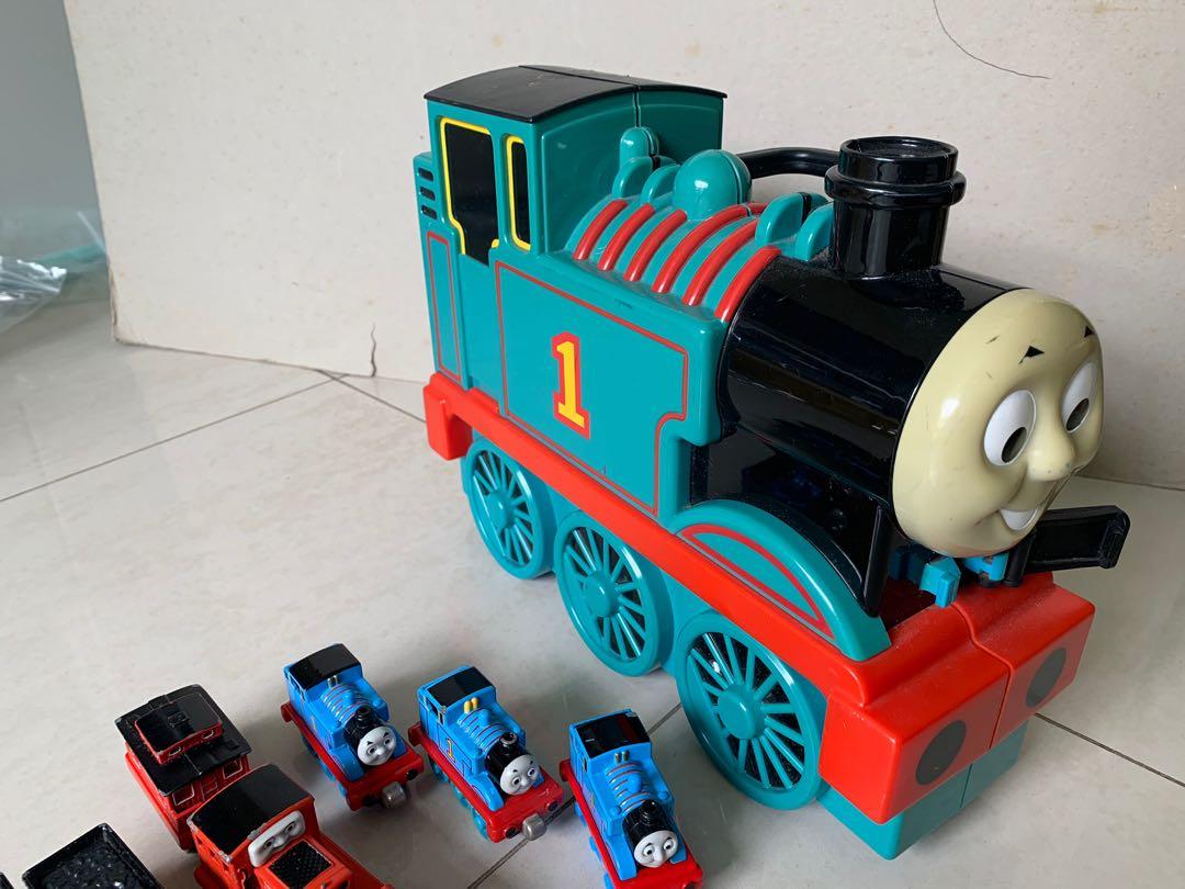 Thomas Train (Category: Toys & Collectibles) located in Singapore. Submitted by soho10 (Listing ID 1042795021, Image 1). Description: Thomas the Train Metallic Trains with Thomas the train train display. Used. .