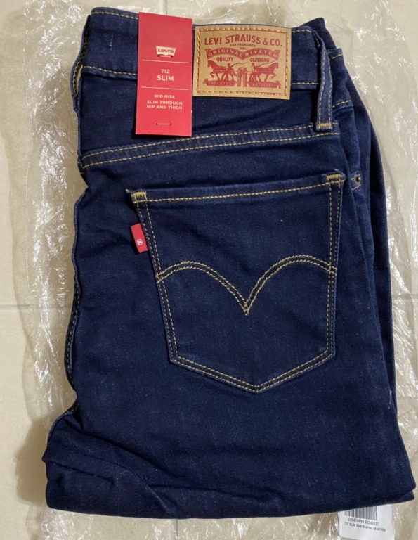 Levi's 712 slim mid rise 2025 slim through hip and thigh
