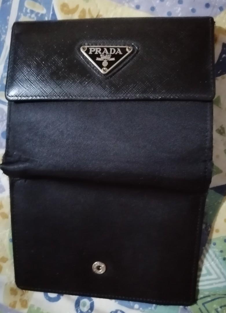 Sale!!! PRADA Fold wallet (Category: Luxury Bags & Wallets) located in Quezon City. Submitted by joykawaii_fashionboutique (Listing ID 1043187041, Image 2). Description: Fold wallet with coin purse, card holder and 2 space for money bills. 😁 Unique style 😍 Classy🤗.