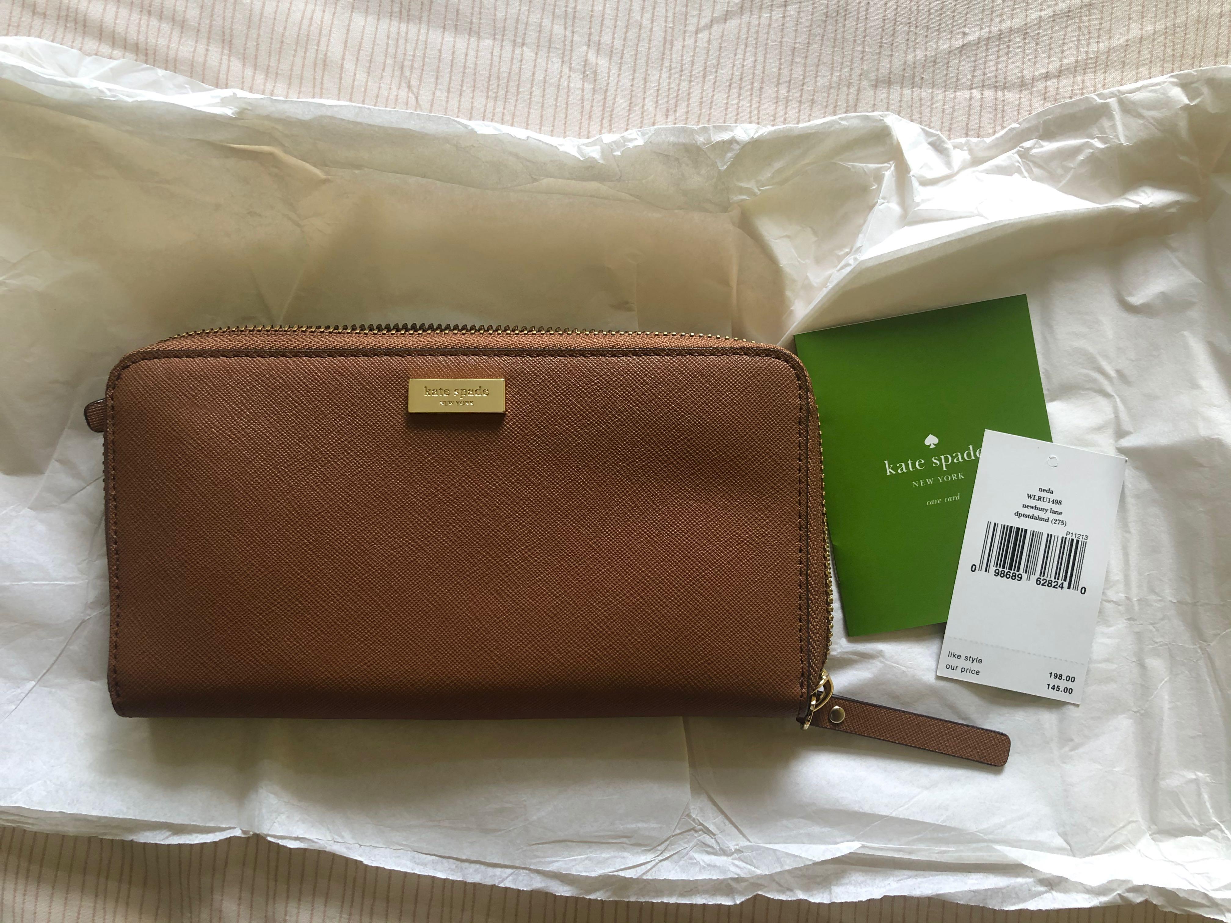 Kate Spade laurel way neda wallet, Women's Fashion, Bags & Wallets, Purses  & Pouches on Carousell