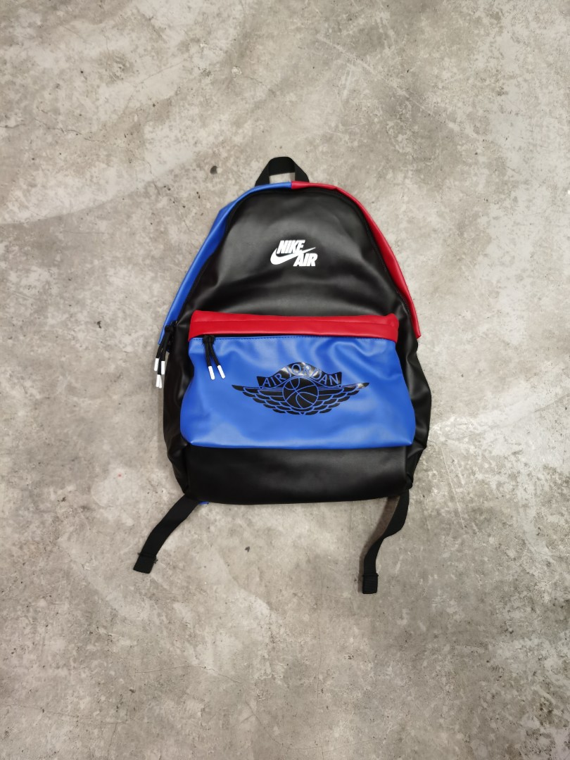 Blue and red nike backpack hot sale