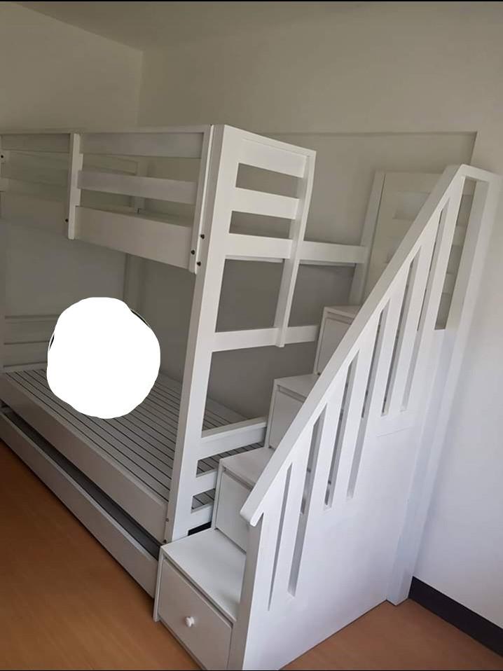 White Double deck w/ stepdrawers and pullout bed 09498310053 (Category: Bed Frames & Mattresses) located in Caloocan City. Submitted by leocarloswoodcrafts (Listing ID 1038895690, Image 2). Description: made from solid mahogany wood. with boysen wood paint white FOAM NOT INCLUDED Available sizes: (in inches) 36x75 top bed 48x75 main bed 36x72 pullover bed Free delivery within metro manila Message me via Facebook fb.com/LeoCarlosWoodCrafts OR emai