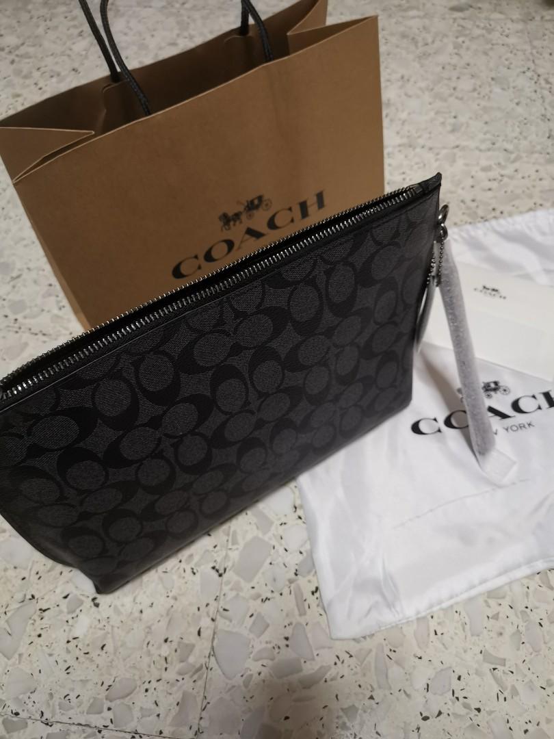 COACH Men's Clutch Bag (Category: Bags & Wallets) located in Singapore. Submitted by allitemsinstocks (Listing ID 1043391181, Image 3). Description: Brand new Instock Size: 29cm x 23cm Comes with Coach Paper Bag, Coach Dust Bag and Coach Care Card Can meet up at clementi or i can arrange courier service for you to your doorstep once payment is made..