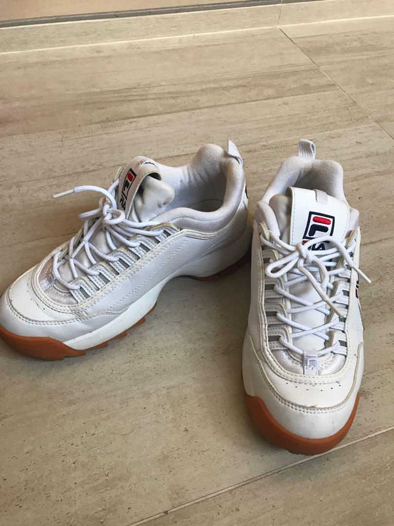 White fila with gum bottoms on sale