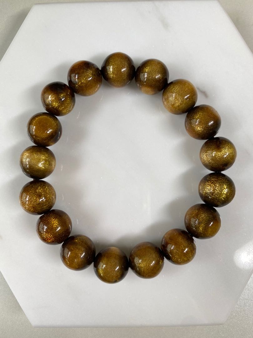 Gold top coral bracelet