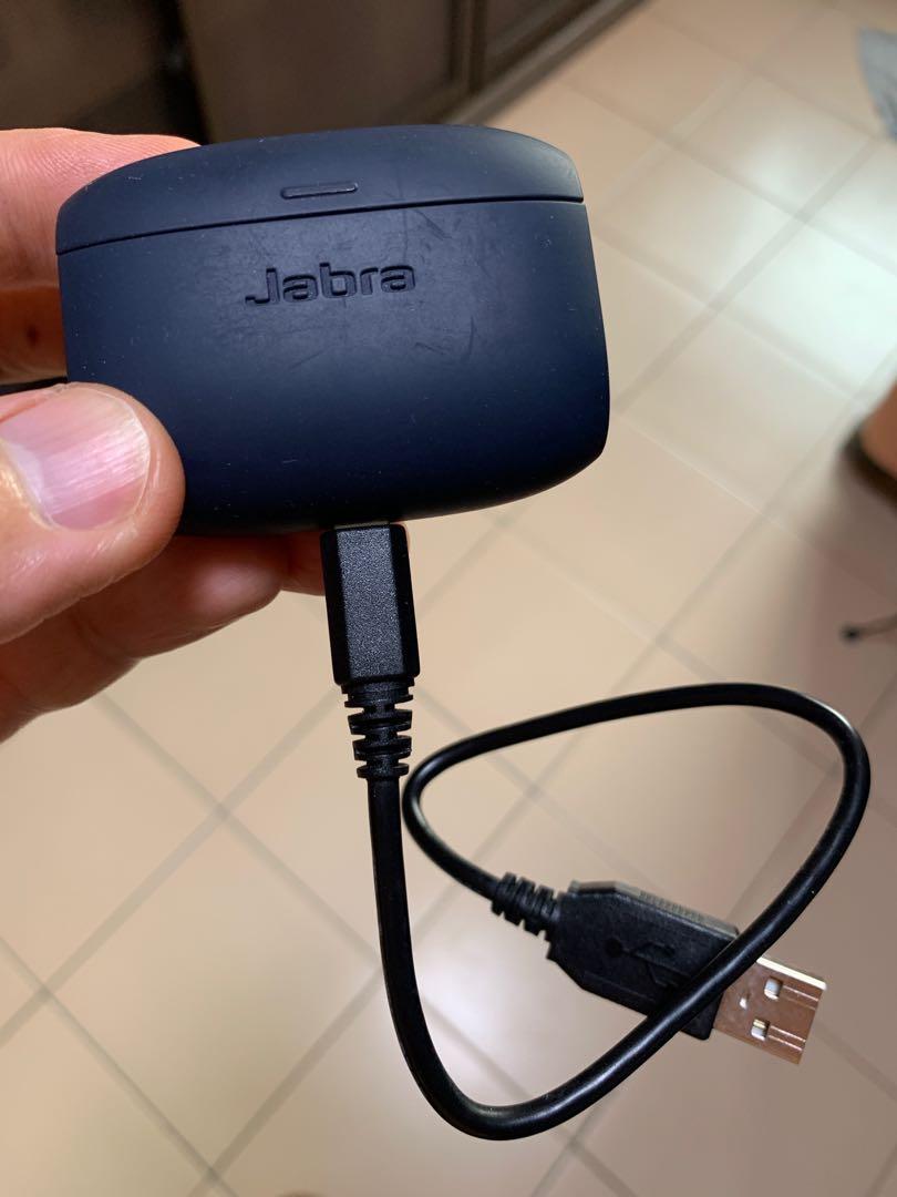 Jabra Elite Active 65t charging case with left earbud charging cable