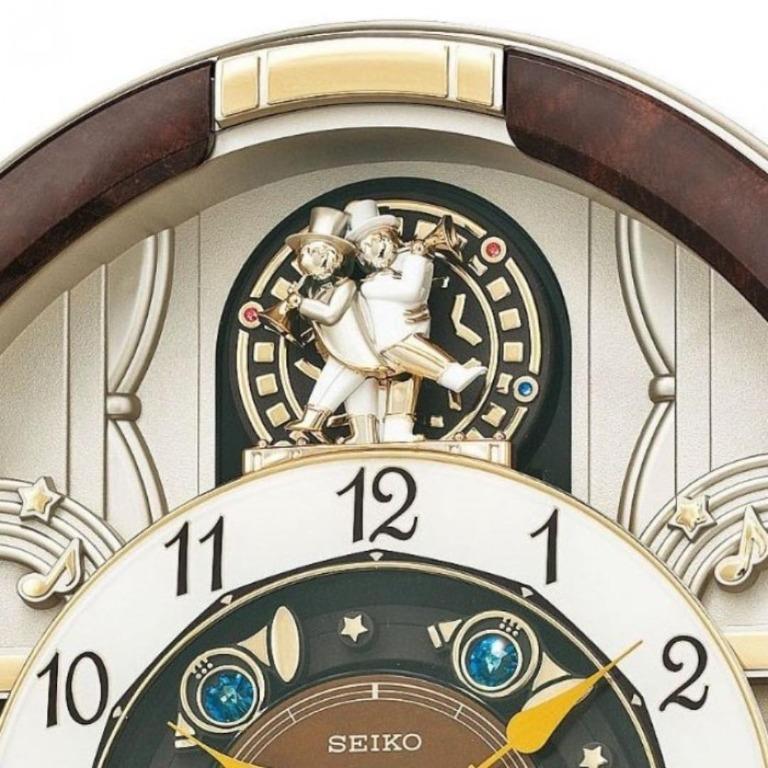 Seiko QXM289BT Melodies in Motion Rotating Pendulum Wall Clock