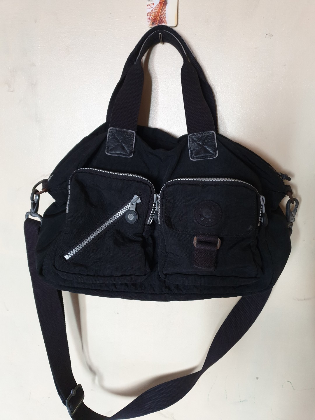 kipling sling bag original vs fake