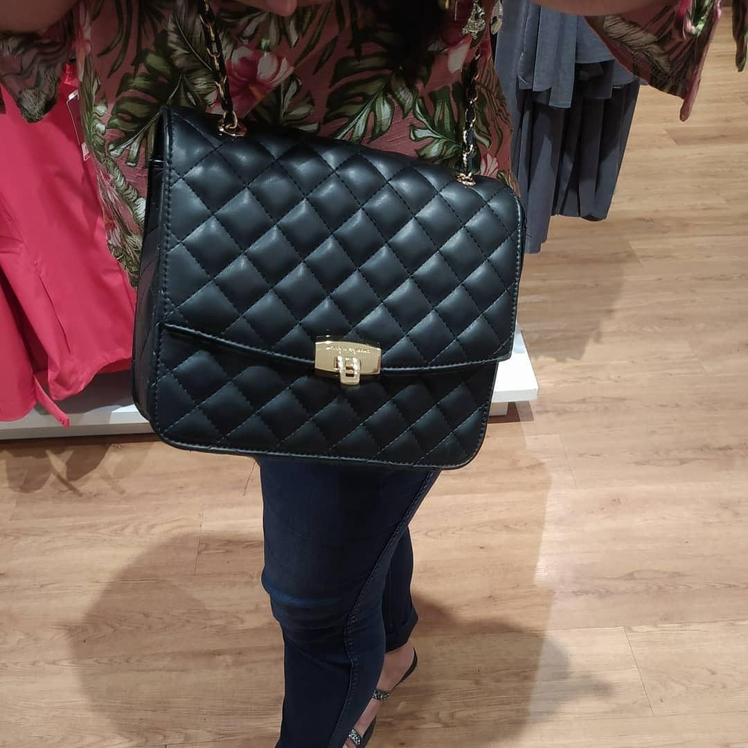 black quilted sling bag