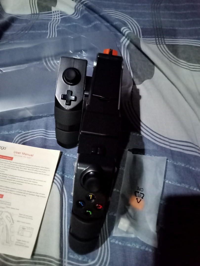Ipega gun controller (Category: Controllers) located in Impasugong. Submitted by sid_the_adorable (Listing ID 1043865276, Image 3). Description: Ipega gun controller The Phantom Shox Supports android, IOS , windows txt me 09059380218.