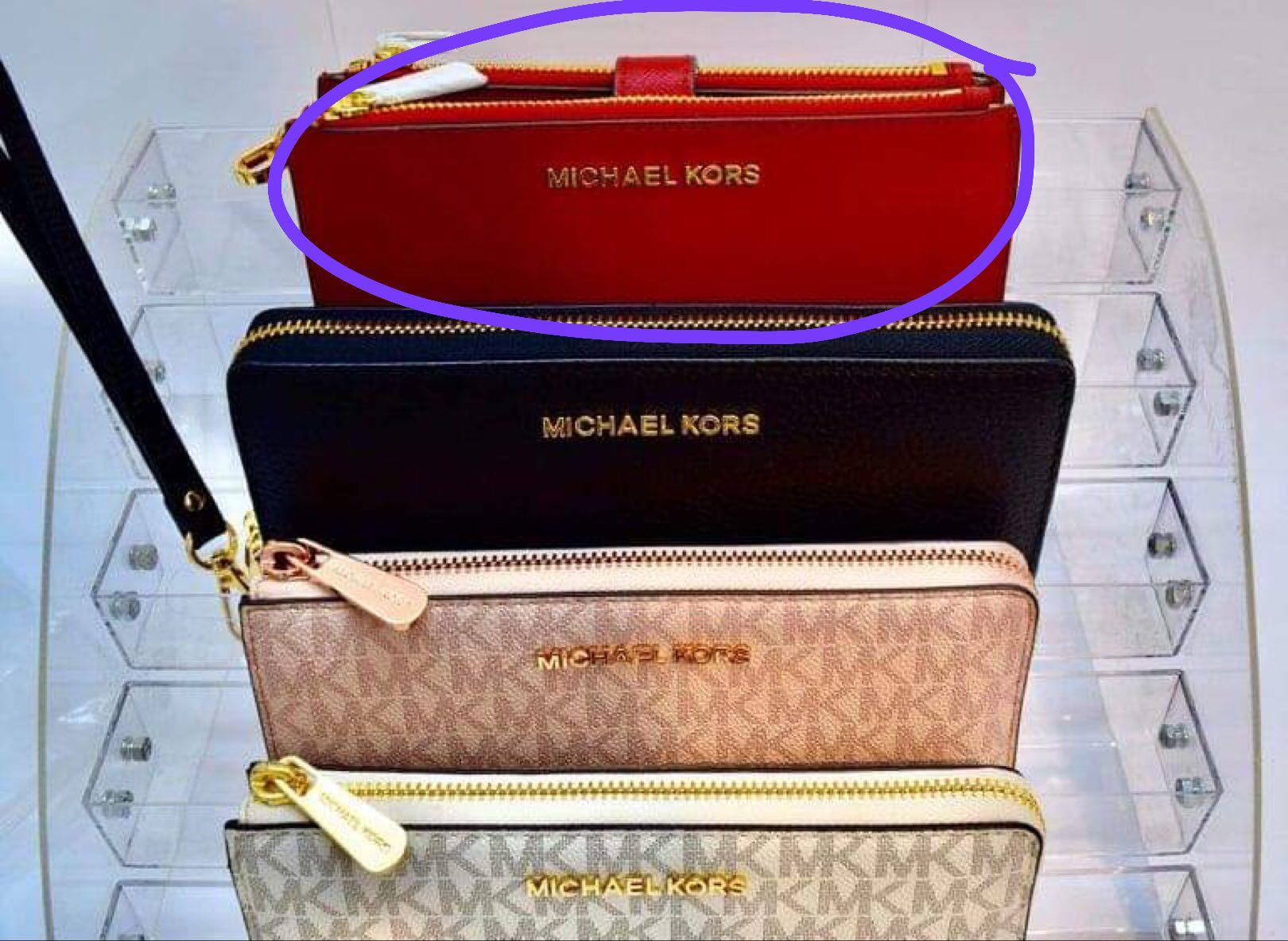 Michael Kors Women's Jet Set Travel Double Zip Wristlet, Women's Fashion,  Bags & Wallets, Wallets & Card holders on Carousell