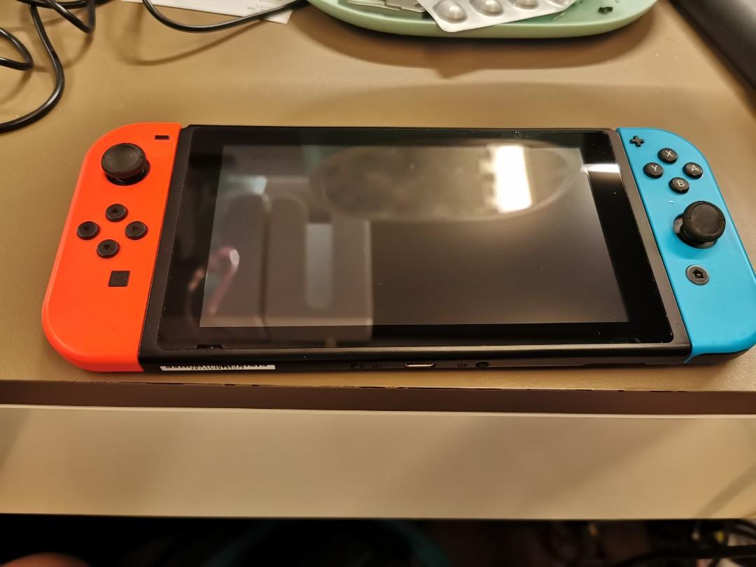 nintendo switch with 4 controllers