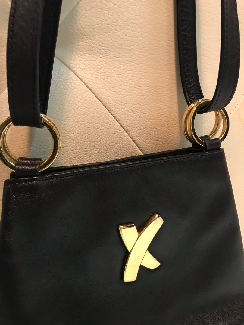 Paloma Picasso Two-Way Leather Bag (Category: Cross-body Bags) located in Orani. Submitted by gudstvff (Listing ID 1043881423, Image 3). Description: Vintage / Rare Find Can be worn like a sling / body bag or shoulder bag 100% Authentic Message me for more details & inquiries.